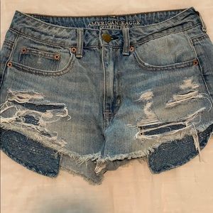 High-waisted, distressed, jean shorts.